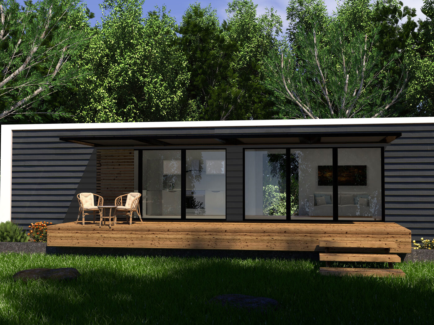 Modern black-clad prefabricated home with glass sliding doors and deck